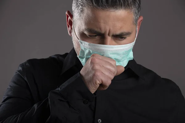 Closed Portrait Man Surgical Mask Coughing Studio Gray Background Healthcare — Stock Photo, Image