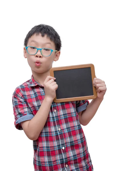 Young boy holding chalkboard over white — Stock Photo, Image