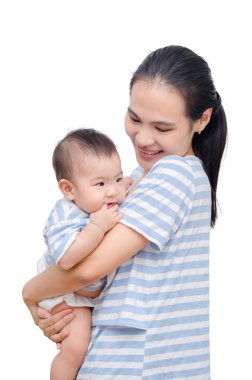 Güzel anne çocuğunu üzerinde beyaz ile