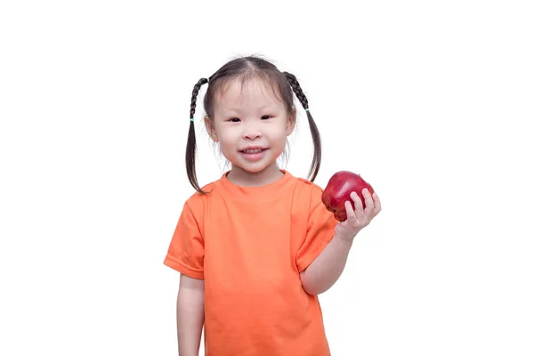 Girl holding an apple over white — Stock Photo, Image