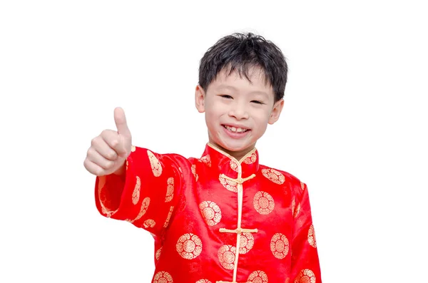 Китайский мальчик в традиционном костюме улыбается — стоковое фото