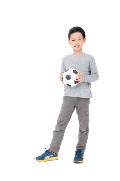 白い背景の上にボールを保持している少年 — ストック写真