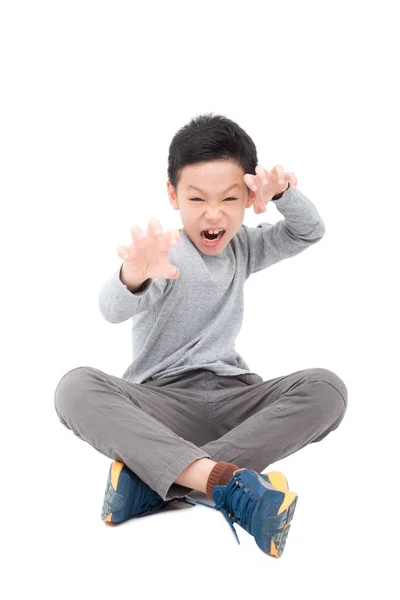 Boy sitting over white — Stock Photo, Image