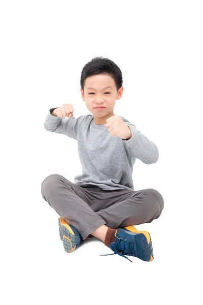 Boy sitting over white — Stock Photo, Image