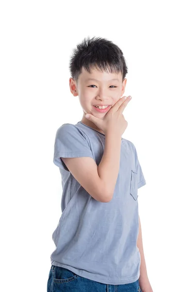 Niño sonriendo sobre fondo blanco — Foto de Stock