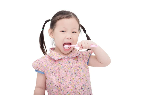 Niña limpiando sus dientes con cepillo de dientes —  Fotos de Stock