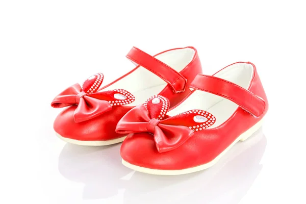 Красные туфли вместо белых — стоковое фото