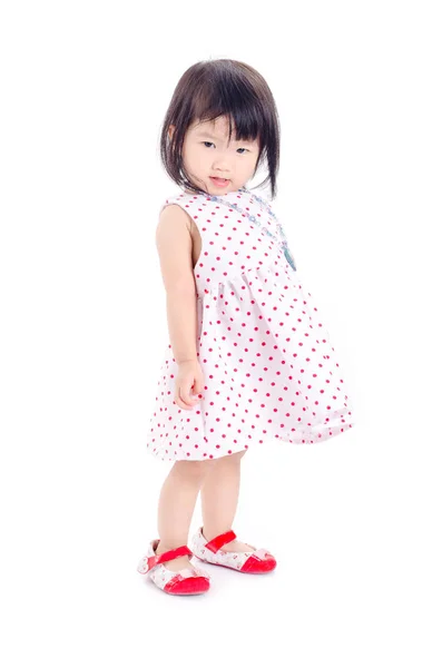 Mała dziewczynka, stojąc nad białym — Zdjęcie stockowe