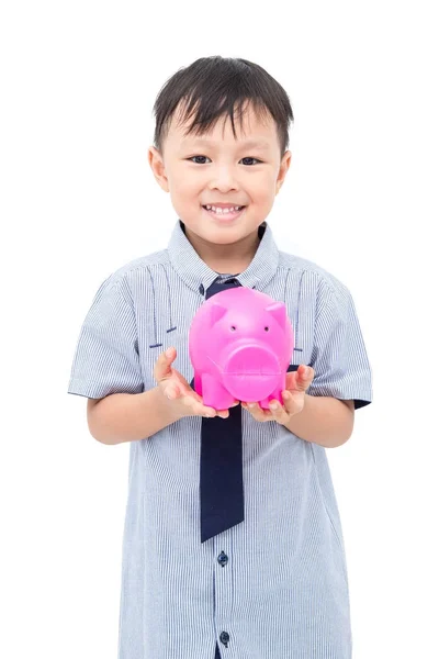 Young boy holding piggy bank over white — Stock Photo, Image