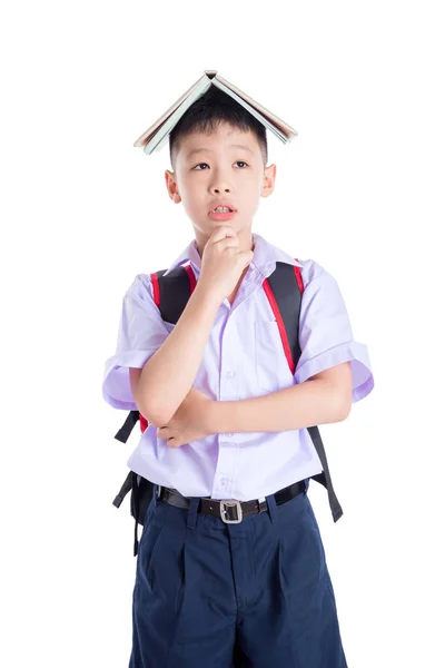 School boy thinking over white background — стоковое фото