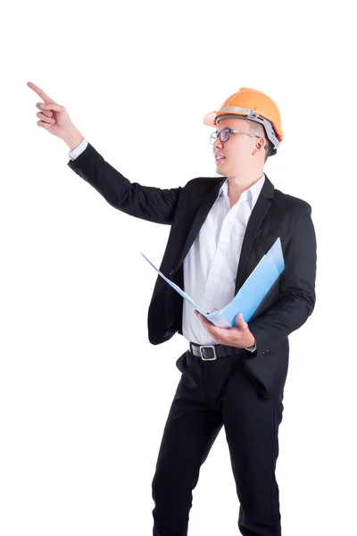 Joven ingeniero vestido con casco naranja y traje negro — Foto de Stock