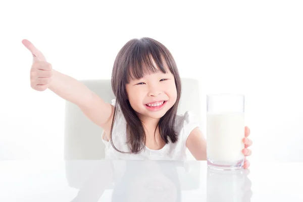 Little Asian Girl Holding Glass Milk Showing Thumb White Background — Stock Photo, Image