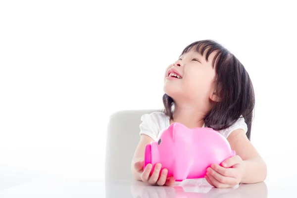 Kleine Asiatische Mädchen Mit Rosa Sparschwein Und Blick Nach Oben — Stockfoto