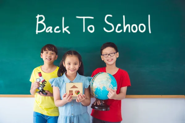 Three Asian Student Smiling Front Chalkboard Text Back School — Stock Photo, Image