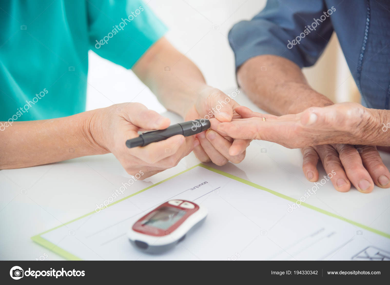 Nurse hands using lancet to checking patient blood sugar Stock Photo by ©parinyabinsuk 194330342