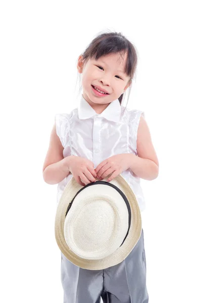 Ragazza tenendo cappello e sorride su sfondo bianco — Foto Stock