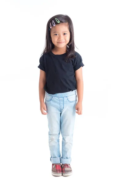 Full length of Little girl standing and smiling isolated over white — ストック写真