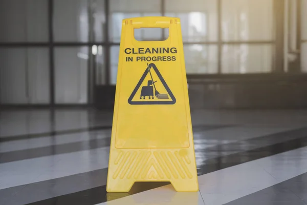 Cleaning progress caution sign in office background — Stock Photo, Image