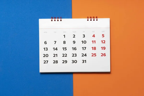 Nahaufnahme Des Kalenders Auf Blauem Und Orangefarbenem Tischhintergrund Planung Für — Stockfoto