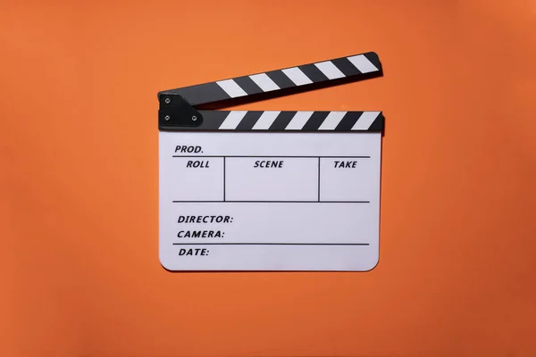 Movie Clapper Orange Table Background Film Cinema Video Photography Concept — Stock Photo, Image
