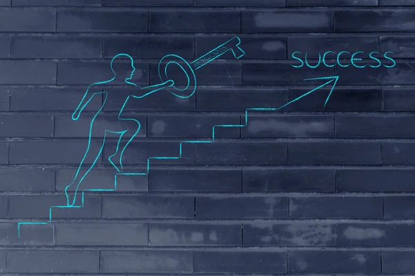 Keywords to reach success, man holding huge key climbing up — Stock Photo, Image
