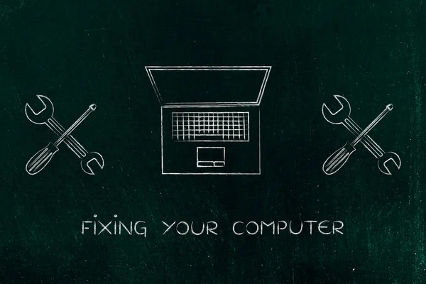 Исправление компьютера, ноутбука с ключом и отверткой — стоковое фото