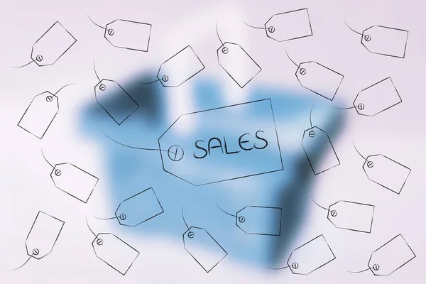 Sales price tag surrounded by other labels flying around — Stock Photo, Image