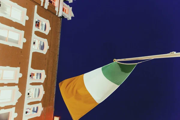 Irish flag waving in front of Grafton Street — Stock Photo, Image