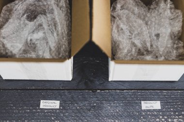 Orijinal ürün ve taklit etiketi dağıtım paketinin içinde 