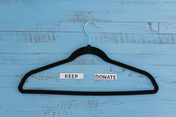 Tidying up and decluttering, clothes hangers with text labels to — 스톡 사진