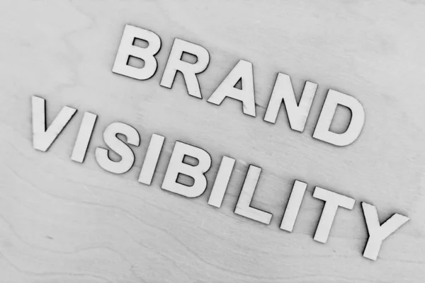 Brand Visibility message on desk with monotone editing, concept