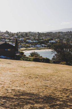 HOBART, TASMANIA - February 17th, 2020: view of Blackman's Bay on a sunny summer day in the late afternoon before dusk, the area is one of the most popular beaches near the city of Hobart