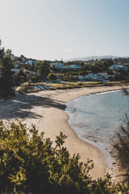 HOBART, TASMANIA - February 17th, 2020: view of Blackman's Bay on a sunny summer day in the late afternoon before dusk, the area is one of the most popular beaches near the city of Hobart