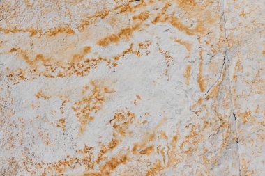 Beyaz ve turuncu tonlarda kumtaşı desenli arka plan çekimi