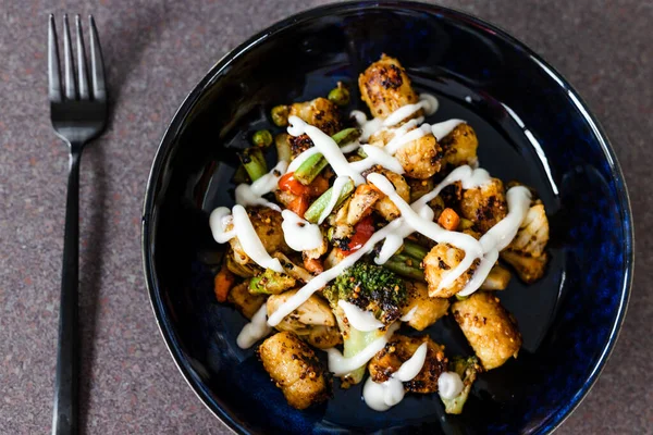 healthy plant-based food recipes, mixed grilled veggies with potato croquettes and veganaise topping
