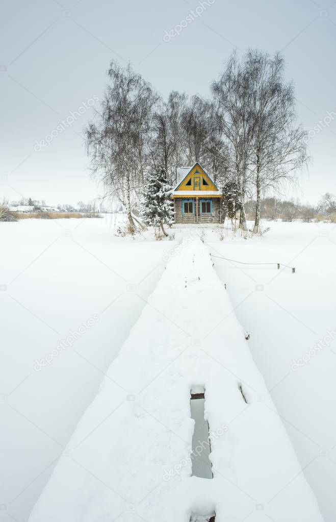 alone house in village in winter