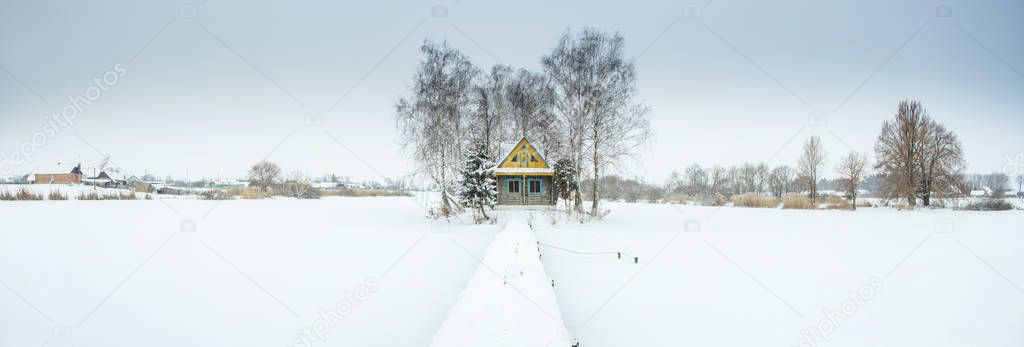 panorama with winter day and farm house