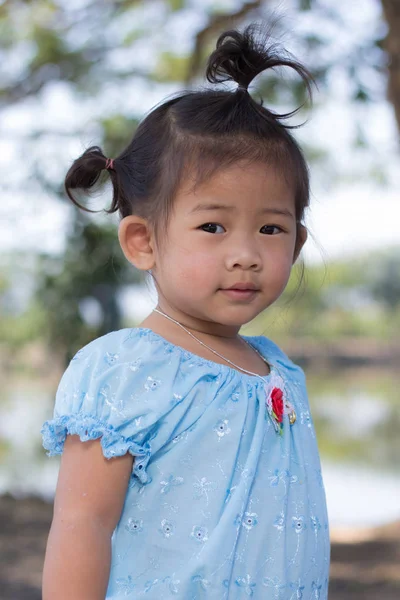 Little asian girl with  lagoon — Stock Photo, Image