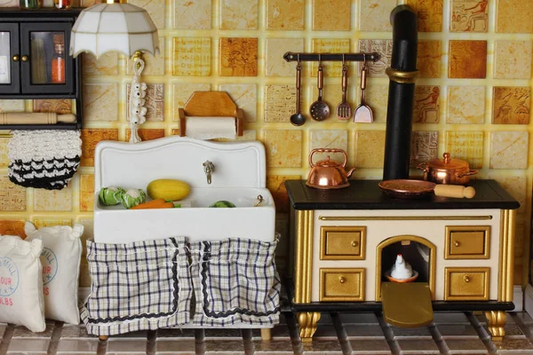 kitchen in Victorian style. Stove, sink and  household utensils  in Victorian doll house interior