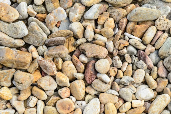 Rocas redondas de la playa utilizadas como fondo —  Fotos de Stock