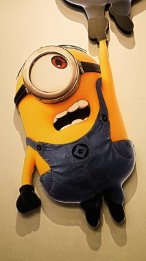 OSAKA, JAPAN - Nov 13, 2019 : Close up HAPPY MINION statue in Universal Studios Japan. Minions are famous character from Despicable Me animation.