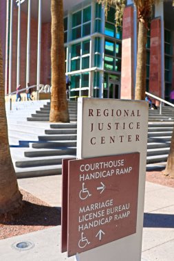 Downtown Las Vegas, NV/USA - Oct 10, 2017: Entrance of Las Vegas Regional Justice Center Court House Building. Criminal cases in Las Vegas are administered at this justice centre building. clipart