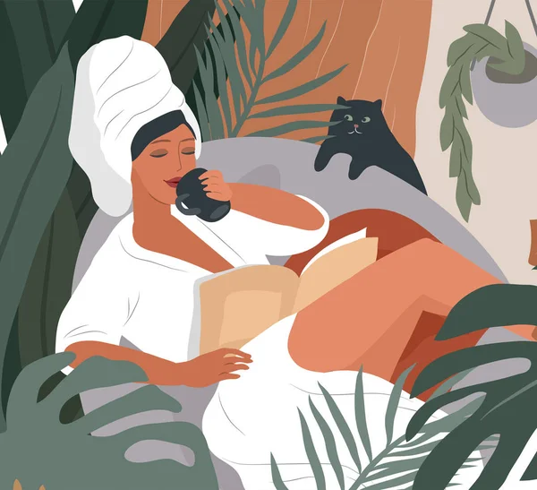 Happy cute girl with towel on head and in bathrobe, drinks coffeeor tea in morning after bathing, read the newspaper and resting with cat. Feminine Daily life by young woman with — Stock Vector