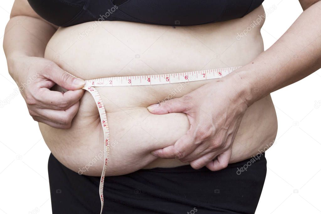 Asian woman showing her stretch marks on her belly with measure 