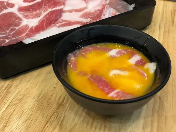 Fresh raw pork in eggs — 스톡 사진