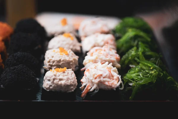 Set of sushi rolls in buffet table — Stock Photo, Image