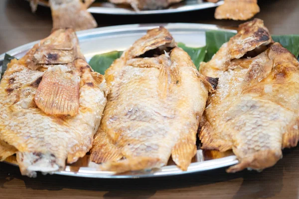 Tilapia grilled wrapping salt — Stock Photo, Image
