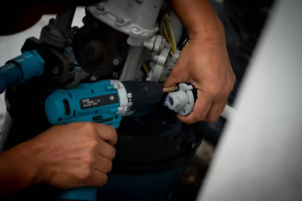Worker use electric hammer drill