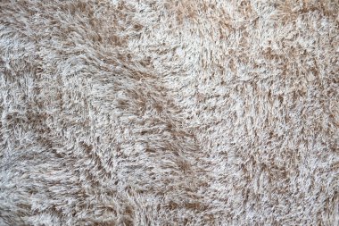 Parçalı beyaz yün halıyı kapatın. Doku arkaplanı,