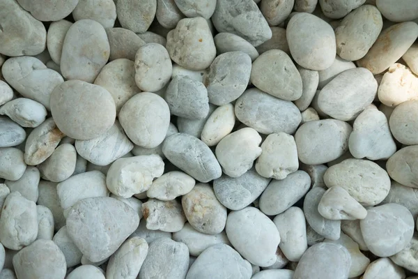White gravel stones background. Stone gravel texture.